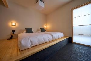 Llit o llits en una habitació de yubune