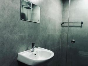 Koupelna v ubytování Garuda Suites