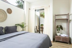 Rainnan Kallih - 3 bedroom Villa near Bali Safari 객실 침대
