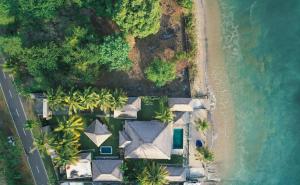 an aerial view of the beach and the ocean at Seaside Villa Kecil in Sekotong