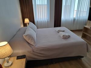 Postel nebo postele na pokoji v ubytování Venue Studios