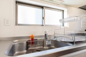 Η κουζίνα ή μικρή κουζίνα στο FUJIMI TOWN HOUSE +38 φωτογραφίες