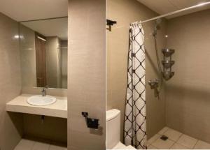 a bathroom with a sink and a toilet and a shower at Apartemen Galeri Ciumbuluit 3 in Bandung
