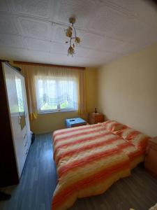 Ένα ή περισσότερα κρεβάτια σε δωμάτιο στο Putnik