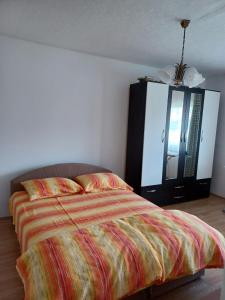 Ένα ή περισσότερα κρεβάτια σε δωμάτιο στο Putnik