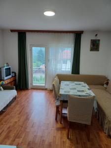 Ένα ή περισσότερα κρεβάτια σε δωμάτιο στο Putnik