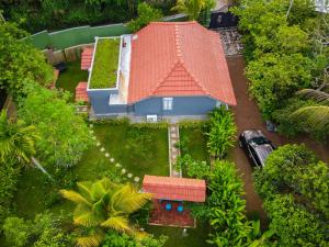 an aerial view of a house with an orange roof at Birdsong Villa Private Garden Retreat in Ratgama Hegoda
