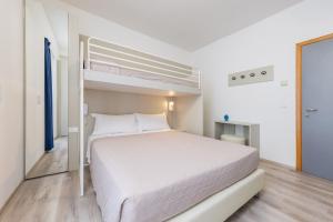 Postel nebo postele na pokoji v ubytování Hotel Madera
