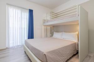 Postel nebo postele na pokoji v ubytování Hotel Madera
