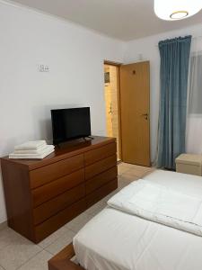 Postel nebo postele na pokoji v ubytování Sharm