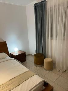 Postel nebo postele na pokoji v ubytování Sharm