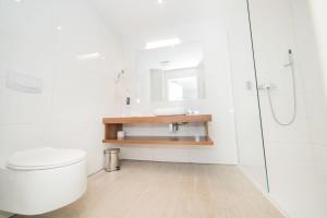 Koupelna v ubytování VacationClub - Livigno Apartament 7 + 14 fotografií