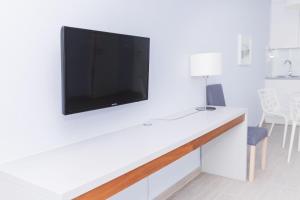 TV a/nebo společenská místnost v ubytování VacationClub - Livigno Apartament 7