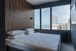 Postel nebo postele na pokoji v ubytování Gumbati Apart Hotel + 37 fotografií