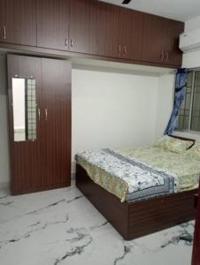 Tempat tidur dalam kamar di Variyar Service Apartments Unit A Ground Floor