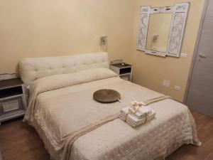 Postel nebo postele na pokoji v ubytování Angy's Rooms