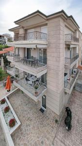an aerial view of a house with a patio at Elia Family Apartment in Neos Marmaras
