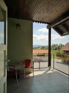 Балкон або тераса в Hostel Mladinski center Šmartno ob Paki