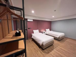 Postel nebo postele na pokoji v ubytování Lima Hotel