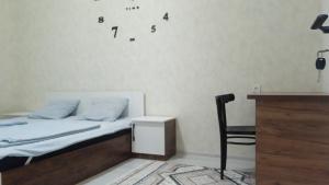 Ένα ή περισσότερα κρεβάτια σε δωμάτιο στο Begzod's room