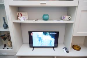 Telewizja i/lub zestaw kina domowego w obiekcie La Scala di Atena