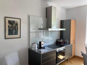 Kuchyň nebo kuchyňský kout v ubytování Helsinki Apartment Erfurt 2 + 15 fotografií