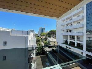 a view from the balcony of a building at MARE Appartamento 8 in Lignano Sabbiadoro