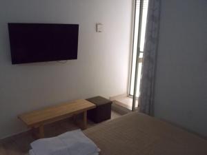 TV a/nebo společenská místnost v ubytování B&B Ninarella Napoli
