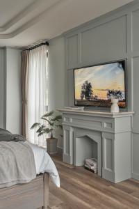 TV a/nebo společenská místnost v ubytování Davilla Đà Lạt Villa Collection