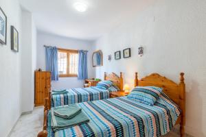 Posteľ alebo postele v izbe v ubytovaní Villa Rafael