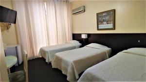 Postel nebo postele na pokoji v ubytování Gran Bolivar Hotel - Trujillo, Perú