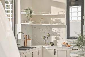 Kuchyň nebo kuchyňský kout v ubytování Davilla Đà Lạt Villa Collection + 37 fotografií