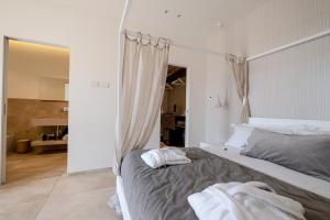 En eller flere senge i et værelse på Gianfranco Fino Viticoltore