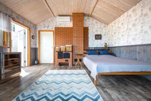 Postel nebo postele na pokoji v ubytování Nordic Bliss - KUMA Beach House with Sauna