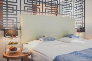 Nuhr Medical - Hotel & Restaurant客房内的一张或多张床位