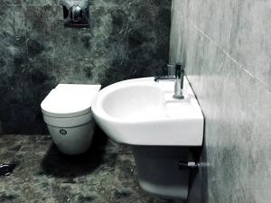 Koupelna v ubytování Garuda Suites