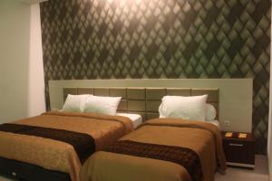 Voodi või voodid majutusasutuse Tlogomas Guest House toas