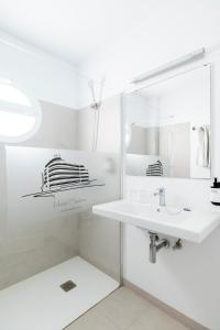 Koupelna v ubytování Hotel Médano