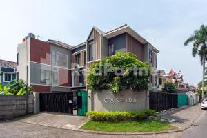 a building with a sign that reads classico at Urbanview Syariah Caseira Citra Raya in Pabuaran