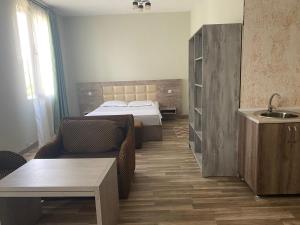 Postel nebo postele na pokoji v ubytování Hotel Amigo II