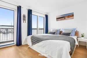 Postel nebo postele na pokoji v ubytování SeaDream