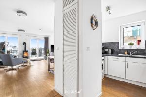 Kuchyň nebo kuchyňský kout v ubytování SeaDream + 24 fotografií