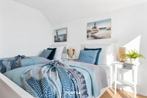 Ein Bett oder Betten in einem Zimmer der Unterkunft Port Seven