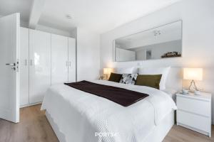 Un pat sau paturi într-o cameră la Grünwald