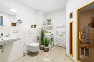 Koupelna v ubytování OstseeOase + 27 fotografií