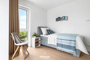 Postel nebo postele na pokoji v ubytování OstseeOase