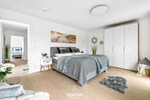 Postel nebo postele na pokoji v ubytování OstseeOase
