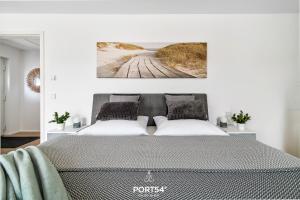 Postel nebo postele na pokoji v ubytování OstseeOase