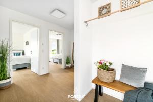 Postel nebo postele na pokoji v ubytování OstseeOase