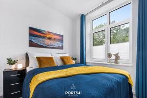 Postel nebo postele na pokoji v ubytování Ferienwohnung Nachtschwärmer, App 17 Emmelsbüll